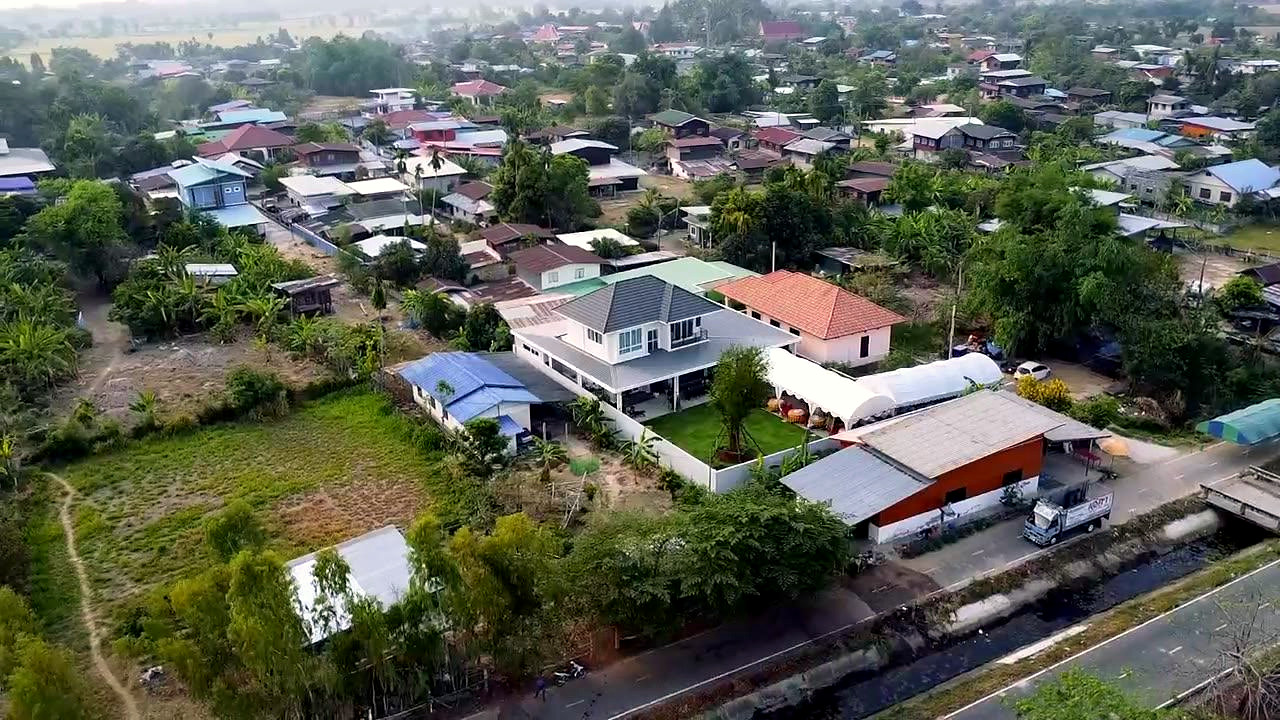 Aerial view of the house Ben built for Ploy in Rattanaburi, Surin